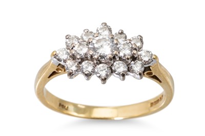 Lot 3 - A DIAMOND CLUSTER RING, mounted in 18ct yellow...