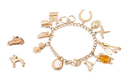 Lot 91 - A 9CT YELLOW GOLD CHAIN BRACELET, with various...