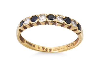 Lot 319 - A SAPPHIRE AND DIAMOND BAND RING, mounted in...