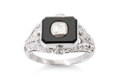Lot 293 - AN ONYX AND DIAMOND RING, the rectangular onyx...