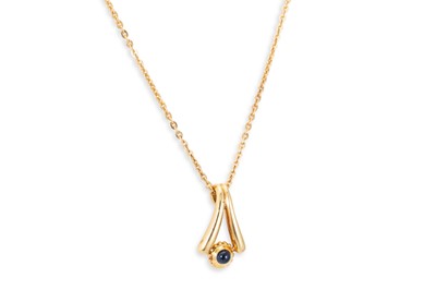 Lot 298 - A VINTAGE CARTIER PENDANT, set with a cabochon...
