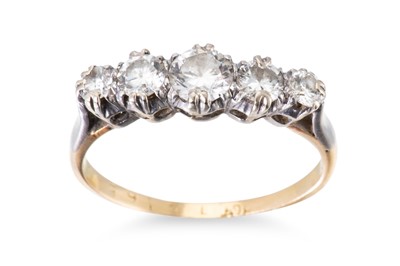 Lot 257 - A DIAMOND FIVE STONE RING, the graduated round...