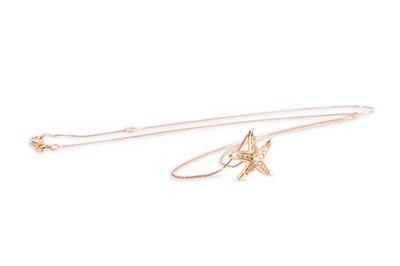 Lot 57 - A DIAMOND SET NOVELTY PENDANT, modelled as a...