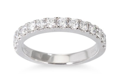 Lot 61 - A DIAMOND HALF ETERNITY RING, the round...