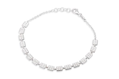 Lot 80 - A DIAMOND SET BRACELET, the pavé set diamond...