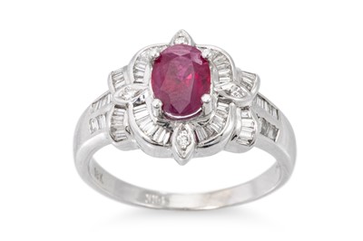 Lot 81 - A RUBY AND DIAMOND SET CLUSTER RING, the...