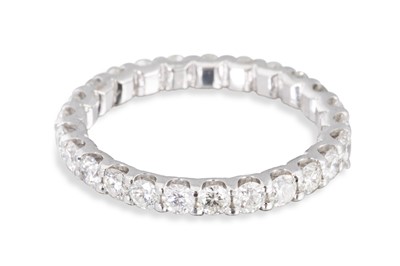 Lot 82 - A FULL BANDED DIAMOND SET ETERNITY RING, the...