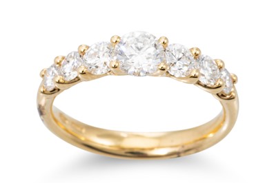 Lot 175 - A GRADUATED DIAMOND SEVEN STONE RING, the...