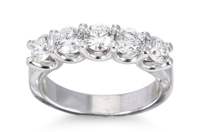 Lot 194 - A DIAMOND SET FIVE STONE RING, the round...