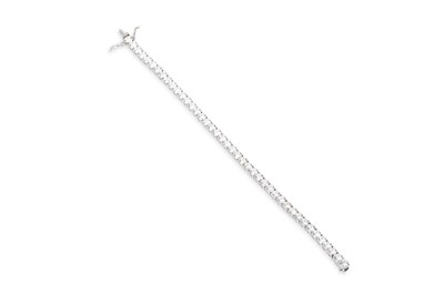 Lot 326 - A DIAMOND LINE BRACELET, the round brilliant...