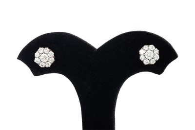 Lot 10 - A PAIR OF DIAMOND CLUSTER EARRINGS, the...