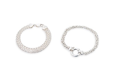 Lot 134 - TWO STERLING SILVER BRACELETS, one featuring...