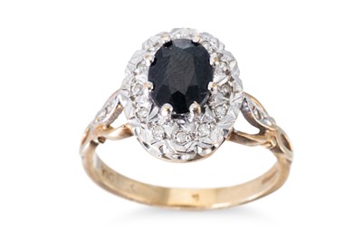 Lot 158 - A DIAMOND AND SAPPHIRE CLUSTER RING, the oval...