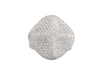 Lot 174 - A DIAMOND PAVE SET DRESS RING, the shaped...