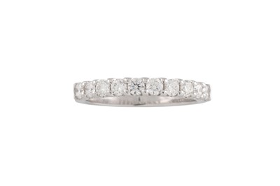 Lot 175 - A DIAMOND HALF ETERNITY RING, the brilliant...