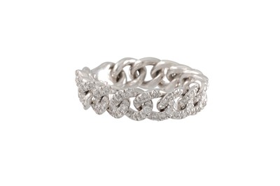 Lot 225 - A DIAMOND SET FLEXI LINK CURB RING, the...