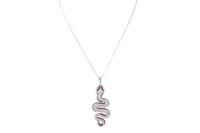 Lot 210 - A DIAMOND AND RUBY SERPENT PENDANT, the...