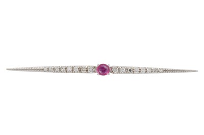 Lot 212 - A DIAMOND AND RUBY BAR BROOCH, the oval ruby...