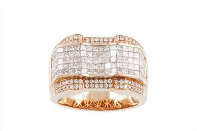 Lot 48 - A DIAMOND DRESS RING, mounted in 18ct rose...