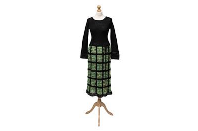 Lot 95 - A BLACK CROCHETED VINTAGE DRESS, plain...