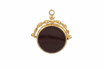 Lot 68 - AN ANTIQUE GOLD SWIVEL SEAL, set with a...