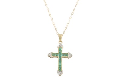 Lot 80 - A DIAMOND AND EMERALD SET CROSS, on a chain,...