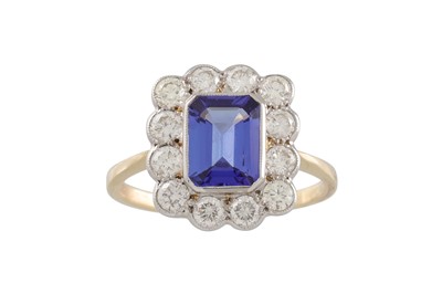 Lot 84 - A DIAMOND AND TANZANITE RING, the rectangular...