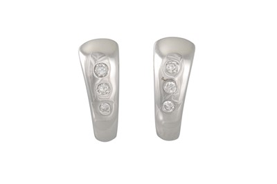 Lot 161 - A PAIR OF DIAMOND EARRINGS, channel set in...