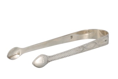 Lot 520 - A GEORGIAN BRIGHT CUT SUGAR TONGS, by Peter...
