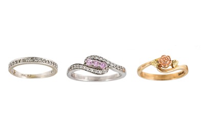 Lot 199 - THREE RINGS, one diamond set (size R), one...