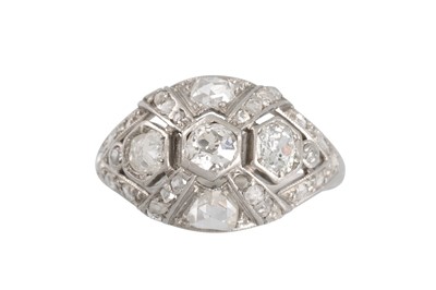 Lot 375 - A VINTAGE DIAMOND CLUSTER RING, bombé form,...