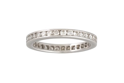 Lot 355 - A DIAMOND ETERNITY RING, the brilliant cut...