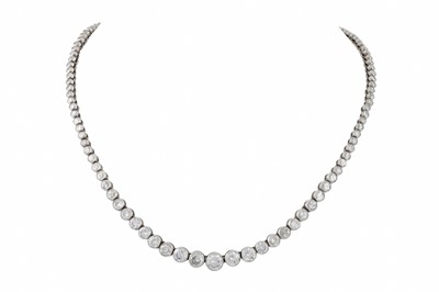 Lot 378 - A DIAMOND LINE NECKLACE, the circular collet...