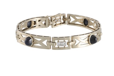 Lot 397 - A SAPPHIRE AND DIAMOND BRACELET, comprising...