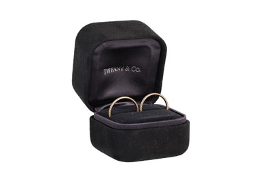 Lot 73 - A PAIR OF TIFFANY & CO 'METRO' DIAMOND SET...
