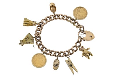 Lot 207 - A 15CT GOLD CHARM BRACELET, consisting of six...