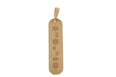 Lot 171 - A 9CT GOLD PENDANT, with ogham markings,...