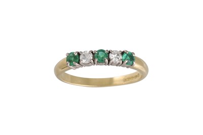 Lot 109 - A DIAMOND AND EMERALD FIVE STONE RING, mounted...