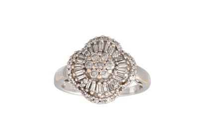 Lot 283 - A DIAMOND CLUSTER DRESS RING, set with round...