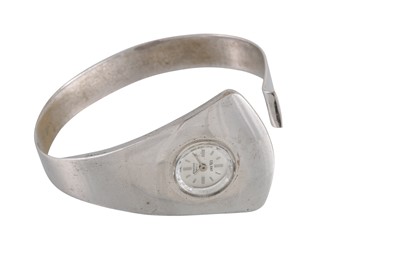 Lot 183 - A SILVER PLATED WATCH BANGLE, by Marika...