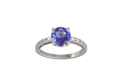 Lot 286 - A TANZANITE SOLITAIRE RING, the oval tanzanite...