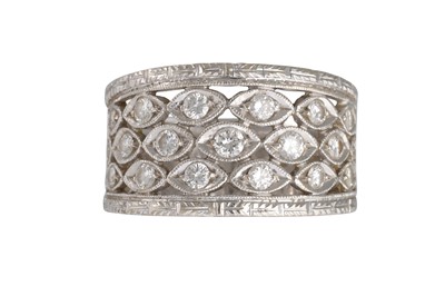 Lot 288 - A THREE ROWED DIAMOND DRESS RING, mounted in...