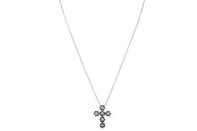 Lot 322 - A SAPPHIRE AND DIAMOND CROSS, on a white gold...
