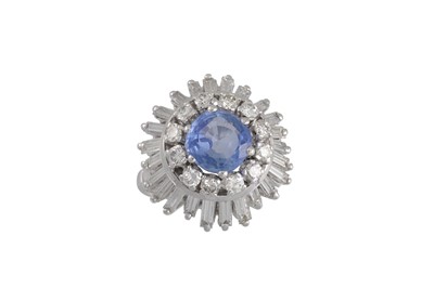 Lot 246 - A DIAMOND AND SAPPHIRE CLUSTER RING, the...
