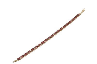 Lot 301 - A SHERRY TOPAZ SET LINE BRACELET, mounted in...