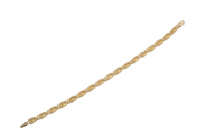 Lot 302 - A CITRINE SET LINE BRACELET, mounted in 14ct...