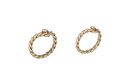 Lot 179 - A PAIR OF DIAMOND SOLITAIRE RINGS, V shaped,...