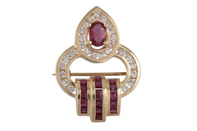 Lot 305 - A RUBY AND DIAMOND BROOCH, of shaped form,...