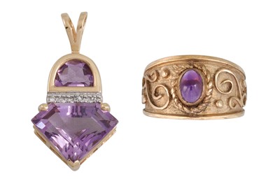 Lot 180 - AN AMETHYST AND DIAMOND PENDANT, mounted in...