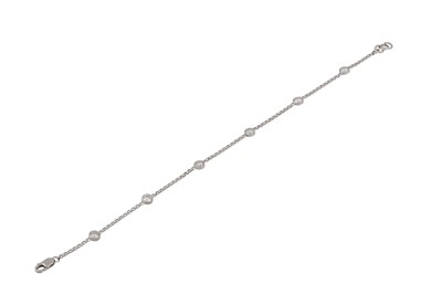 Lot 366 - A DIAMOND BRACELET, the collet set diamonds...